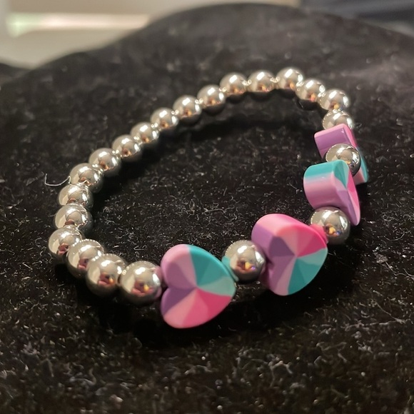 7” beaded stackable stretch bracelet with 23 silver beads & 4 heart shaped beads - Picture 6 of 13